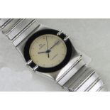 Gentlemen's Omega Constellation wristwatch, circular dial with black bezel under glass, stainless