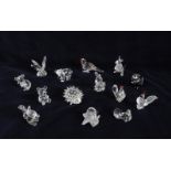 A collection of Swarovski crystal animals including; Koala (1987), Mother kangaroo (1994), Butterfly