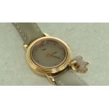 *Ladies' Radley wristwatch with round dial on a beige leather strap (Lot subject to VAT)