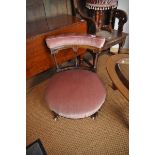 Victorian mahogany nursing chair with plush pink upholstery