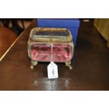 *A late 19th century French jewellery box with bevelled glass sides in ormolu mounts (Lot subject to