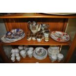 Two shelves of assorted porcelain including an Imari plate, twelve place teaset and other various