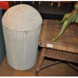 A wicker table and laundry basket