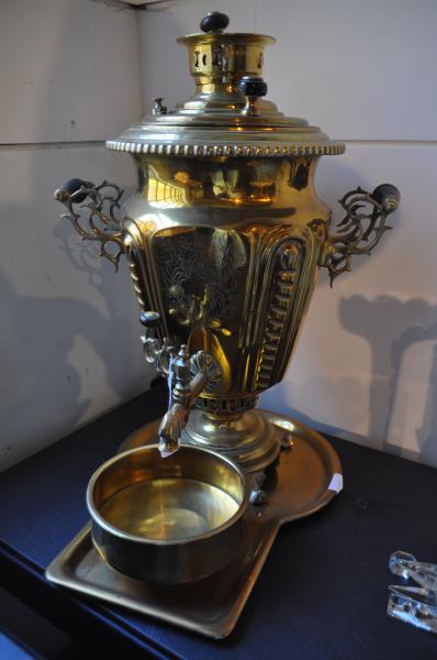 A late 19th Century Russian brass Samovar with bowl, tray and impressed makers mark