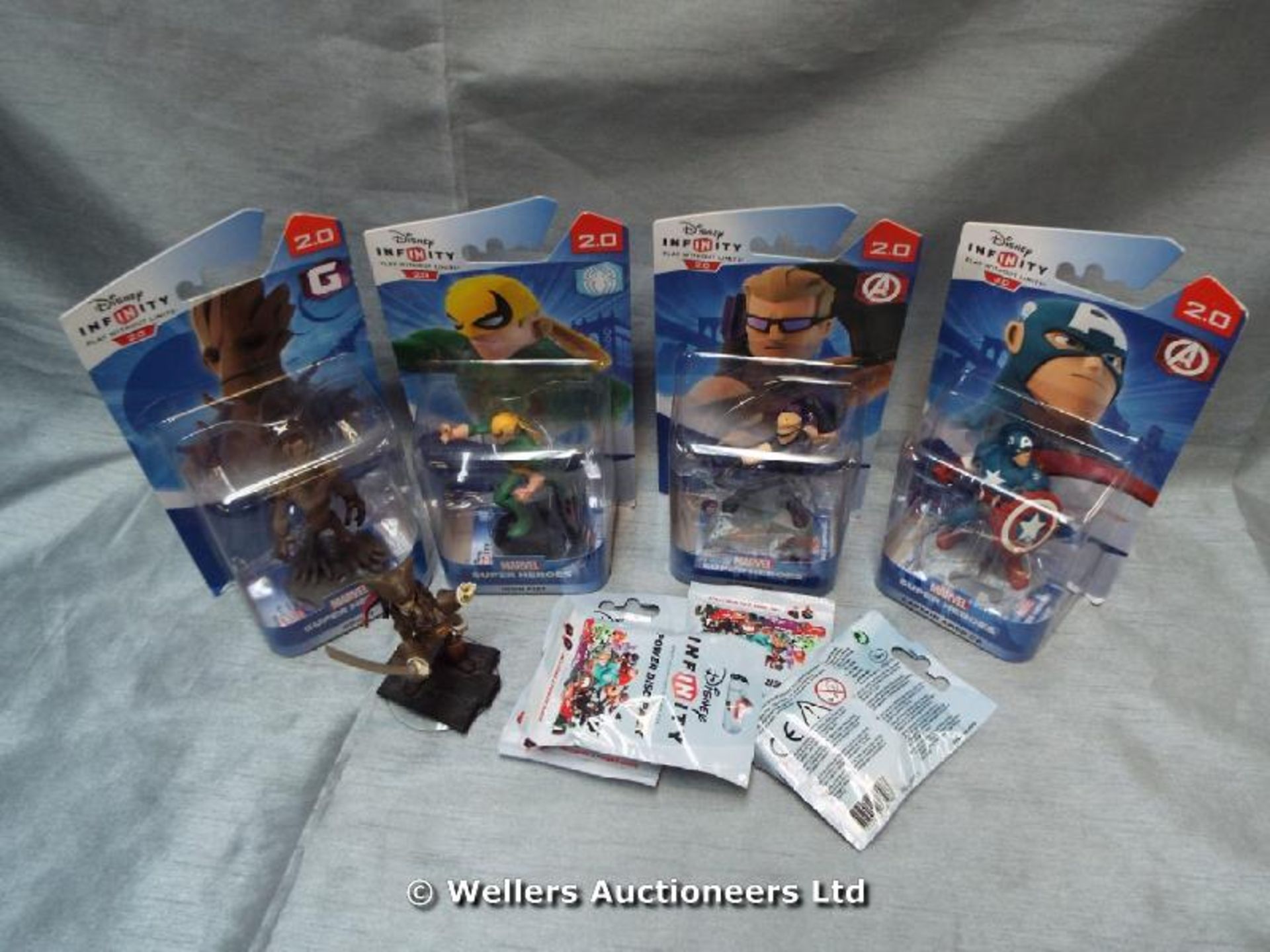 *X9 MOSTLY BOXED AND PACKAGED DISNEY INFINITY FIGURES AND POWER DISC PACKS / GRADE: UNCLAIMED