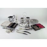 A collection of plated cutlery, candlesticks and other items