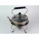 An Edwardian silver plated kettle on stand with burner, the kettle with turned wood handle