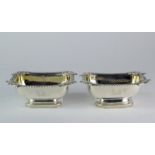 A pair of George III rectangular silver salts with gadrooned and shell border, London 1809