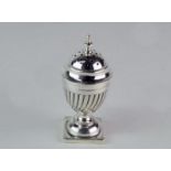 A Victorian silver urn shaped pepperette with spirally fluted body, on square base, Birmingham,