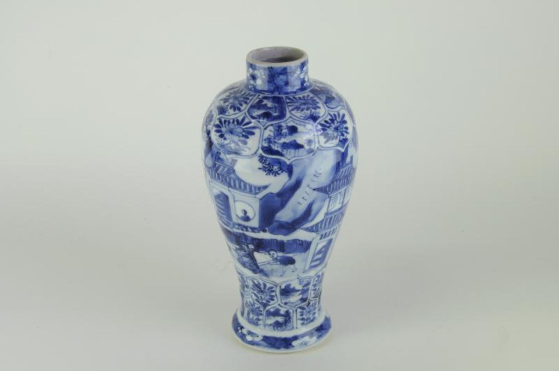 A Chinese Kangxi baluster shaped vase mould with lotus panels and a mountainous landscape with