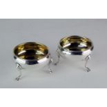A pair of George III silver salts, with gilt interiors on three hoof style feet, London 1784, 79g