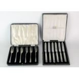 A set of six tea knives with hammered silver handles by W H Haseler Ltd, boxed, Birmingham 1930