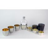 Two plated extendable stirrup cups and a plated hip flask