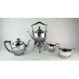A Walker and Hall silver plated half fluted tea set comprising a kettle and burner, a teapot, milk