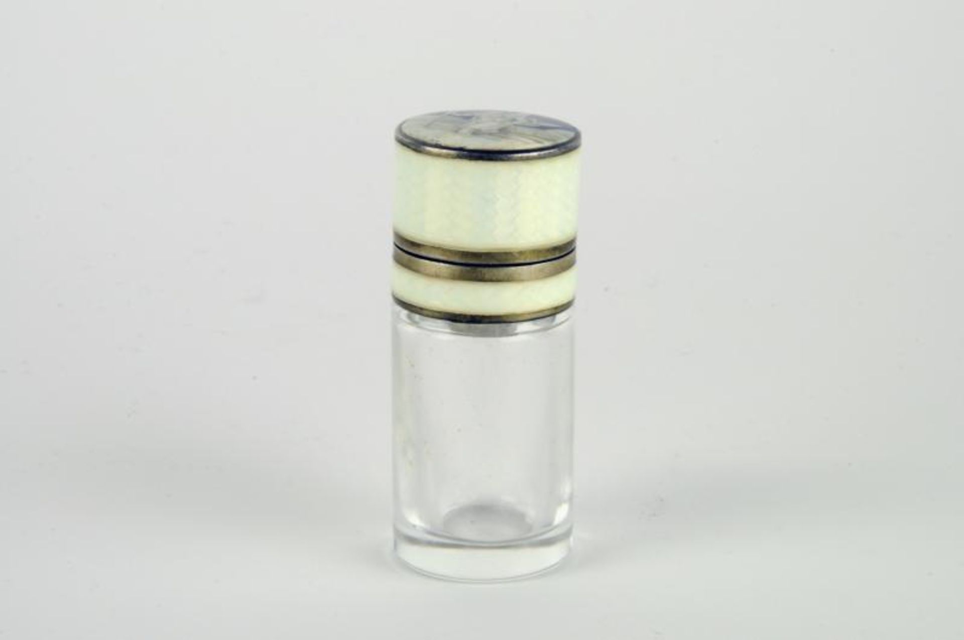 *A continental glass scent bottle, possibly French, the silver gilt enamelled top, with a