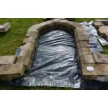 *AN ARCHED STONE DOORWAY AND THREE OTHER ASSOCIATED STONE PIECES, 2300 HIGH, INTERNAL WIDTH APPROX