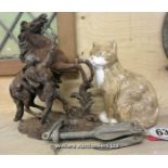 *A SPELTRE FIGURE, AN ANCHOR AND A PORCELAIN CAT