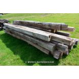 *A SELECTION OF SEVENTEEN RECLAIMED OAK AND ELMS BEAMS, THE LONGEST 5000