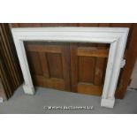 *A WHITE PAINTED PITCHED PINE FIRE SURROUND, 1360 X 1050