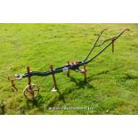 *A HORSE DRAWN THREE TINE CULTIVATOR