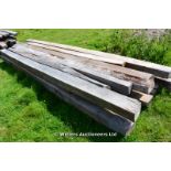 *A SELECTION OF APPROX TWELVE WANEY ENGLISH OAK BEAMS, THE LONGEST 4400