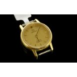 *Ladies' Omega De Ville wristwatch, gold coloured dial with baton hour markers, gold plated case and