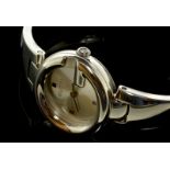 *Ladies' Gucci stainless steel bangle wristwatch, sunburst silver dial with square hour markers at