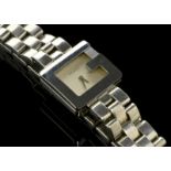 *Ladies' Gucci bracelet wristwatch, brushed silver dial, Gucci (G) shaped bezel, sapphire crystal