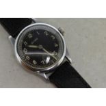 Gentlemen's Grana wristwatch, circular black dial, applied luminous hour markers on outer track,