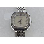 Gentlemen's Omega Constellation automatic bracelet wristwatch, cushion shaped satin silver dial,