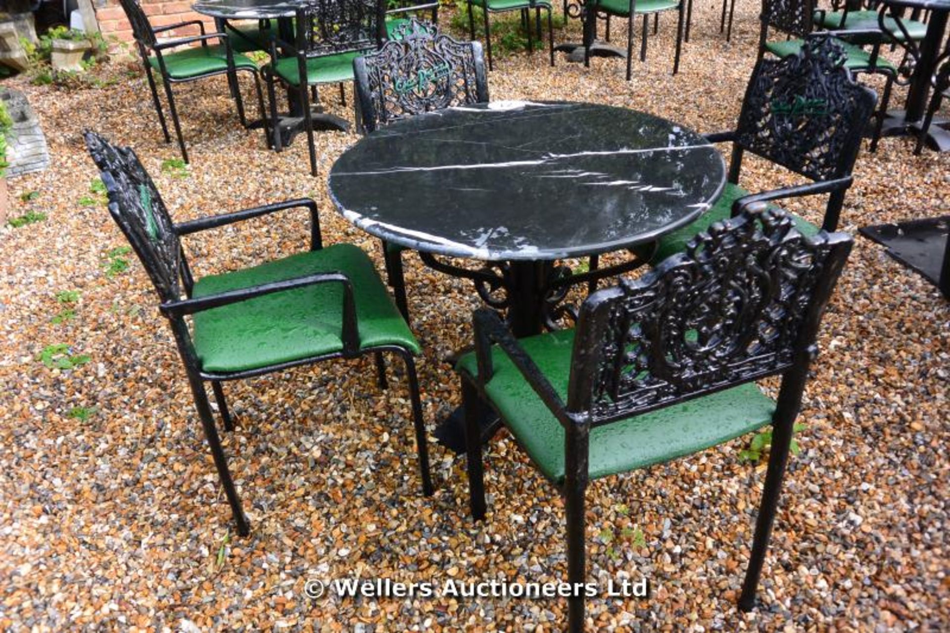 SALVAGED FROM CAMDEN LOCK MARKET, CIRCULAR GREY MARBLE TOPPED RESTAURANT/GARDEN TABLE ON CAST IRON