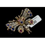 Victorian ruby, sapphire, diamond and pearl butterfly brooch, central round cut sapphire, surmounted