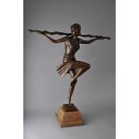 After Pierre Le Faguays, Art Deco style dancer balanced on one leg with cane across shoulders,