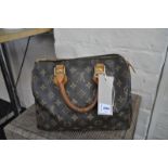 A Louis Vuitton "Speedy" 25 monogram bag, date code DU4069