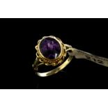 Single stone purple Blue John doublet ring, set in 9ct yellow gold, ring size O