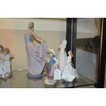 Two Lladro figures: 5050 Dancer, boxed and a flower girl; two Royal Doulton figures HN3491