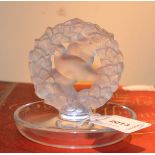 *A Lalique tray with frosted glass bird in a wreath, the base incised 'Lalique' France, 10cm h (
