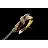 Ruby and diamond ring, row of Swiss cut diamonds and a row of square cut rubies in a crossover