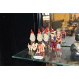 Celluloid figures of Popeye, Pluto, three dwarves and a sailor; four other items