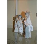 Lladro figure no. 4542 a group of three angels, boxed; no 4675 Baltasar Belen, boxed