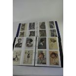 Two postcard albums containing embroidered silks, WWII scenes, topography, shipping, beauties and