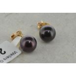 Black pearl ear studs, 7.4mm black pearl set in yellow metal, butterfly stamped 9ct