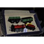 A Hornby tinplate train set comprising clockwork locomotive and tender numbered 6161 and two goods