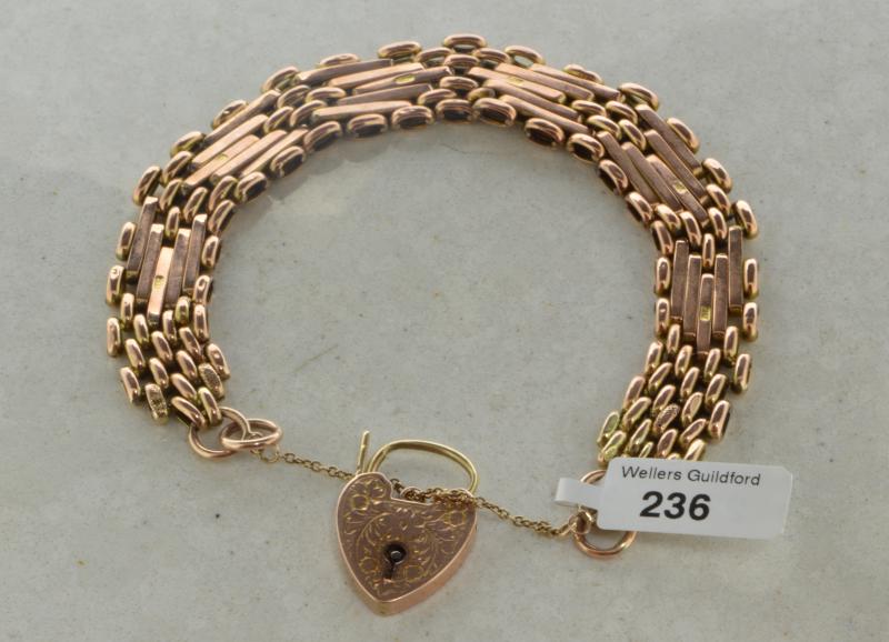 9ct yellow gold fancy link gate bracelet, padlock clasp with floral engraving and safety chain,