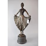 After Chiparus, Art Deco style dancer with flared skirt, 26cm x 52 x 13.5cm, 6.5kg