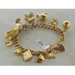 9ct yellow gold charm bracelet, curb link bracelet with padlock clasp and safety chain, with
