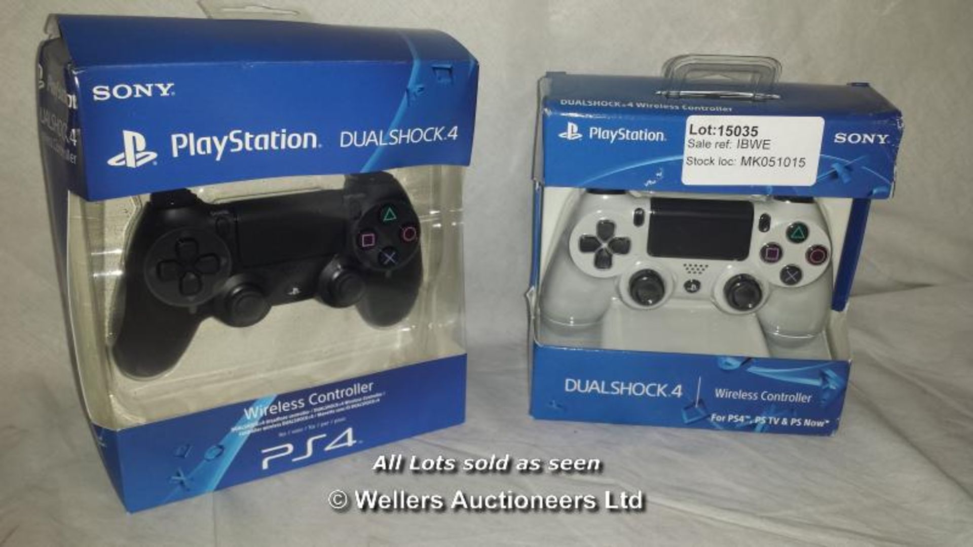 2X SONY PLAYSTATION 4 CONTROLLERS, ONE WHITE AND ONE BLACK (THIS LOT IS FOR DELIVERY ONLY) /