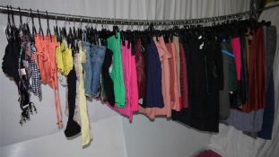 82 x Items Of Assorted Women's Clothing - Box407 - Shorts, Skirts, Pants, Tops & Swimwear - Sizes