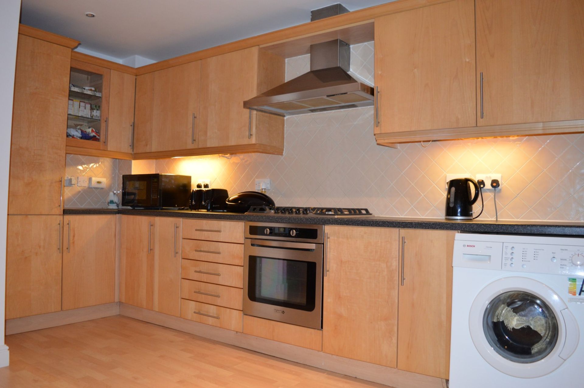 1 x Manor Cabinet Company Fitted Kitchen - Contemporary Beech Finish With Black Worktops and - Image 9 of 47