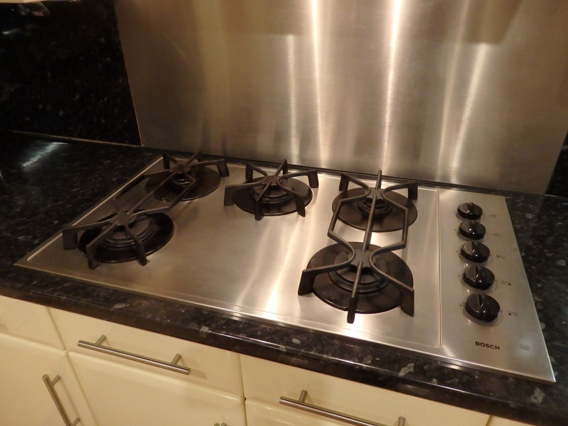 1 x Hygena Fitted Kitchen - Cream Gloss Doors With T Bar Handles - Black Granite Worktops - Bosch - Image 49 of 77